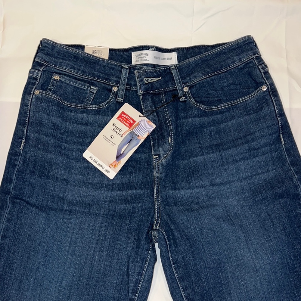 Levi’s Mid Rise Skinny Crop.